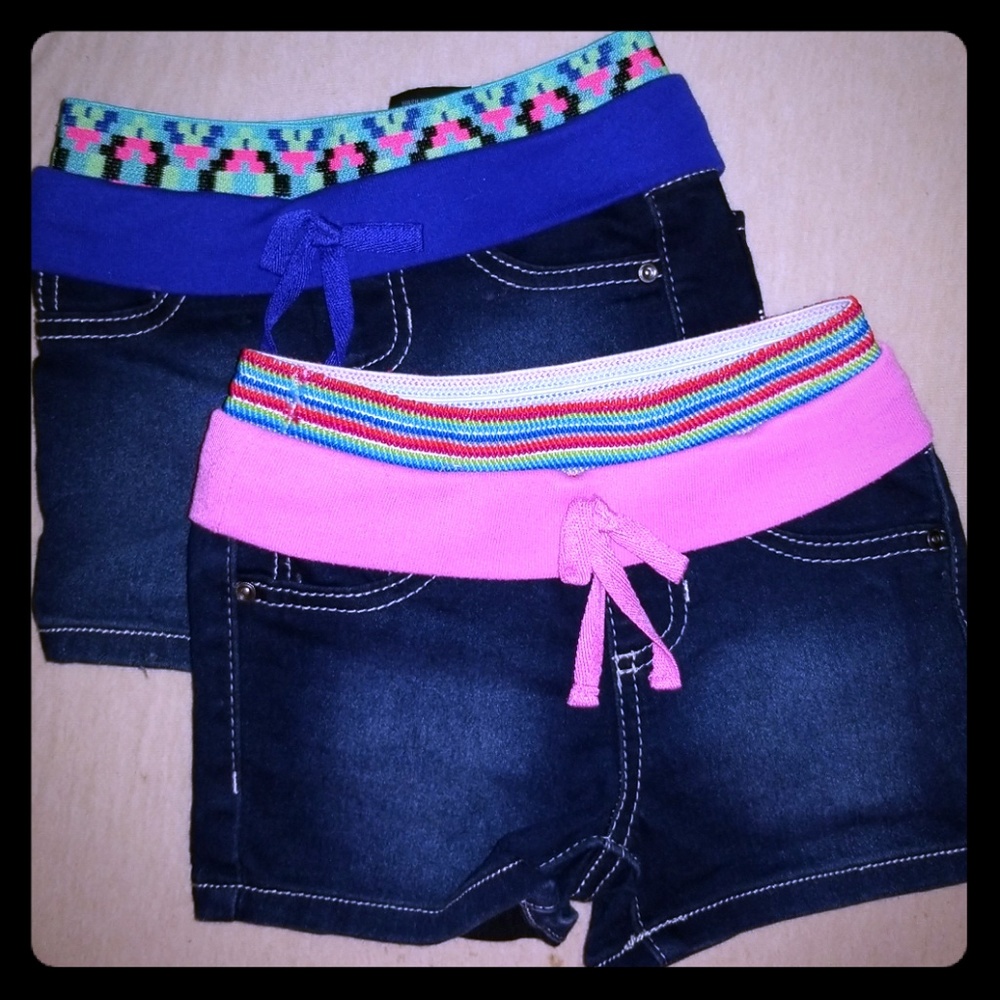 TWO PAIRS OF GIRLS SHORTS SIZE 5 & 6